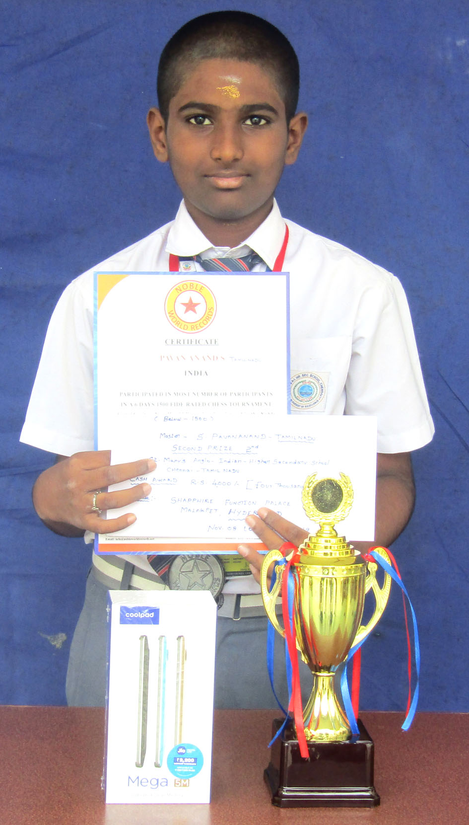 MASTER PAVAN ANAND S of 8A Ist place in the Chess competition organised by Kilpauk Chess center &  IInd place in the FIDE rated Chess Tournament organised by Valliammai Trust.